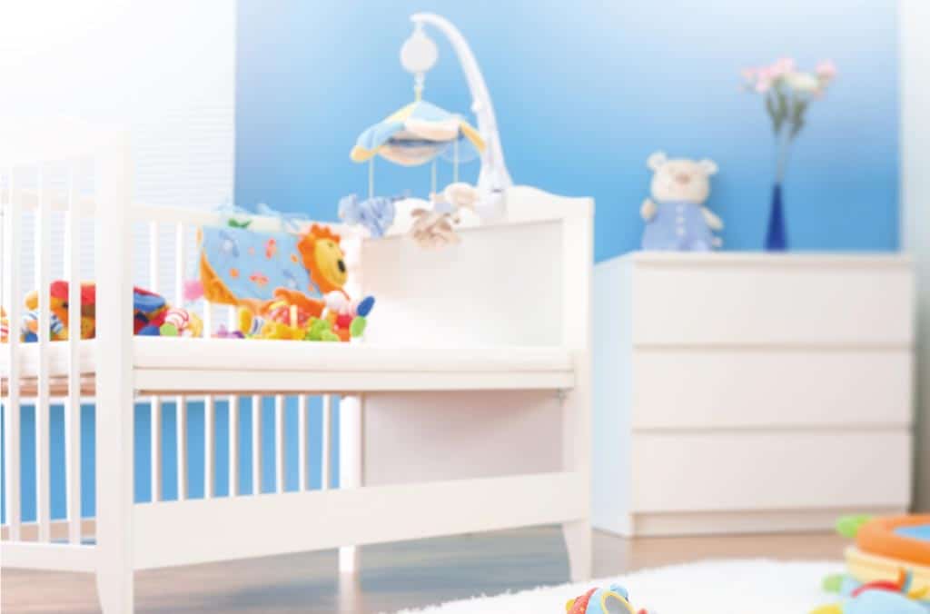 Putting Baby in a Crib With Too Many Toys